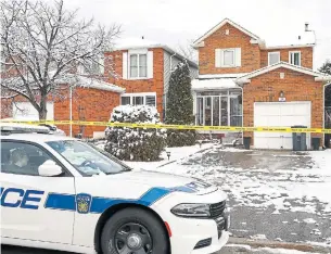  ?? BRYON JOHNSON METROLAND FILE PHOTO ?? Police at 29 Stalbridge Ave. in Brampton, where a man died in an illegal basement apartment fire.