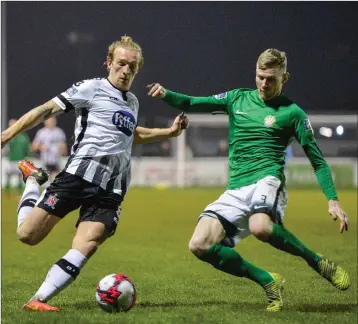 ??  ?? John Mountney of Dundalk in action against Bray’s Kevin Lynch during the SSE Airtricity League Premier clash at the Carlisle Grounds last Friday evening.