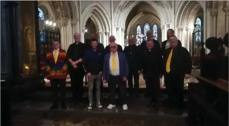  ??  ?? Cór Chúil Aodha director Peadar Ó Riada (far left) with the choir at Christ Church Cathedral after Sunday’s historic service. Also pictured are Canon Gary Hastings and Reverend Trevor Sargent.