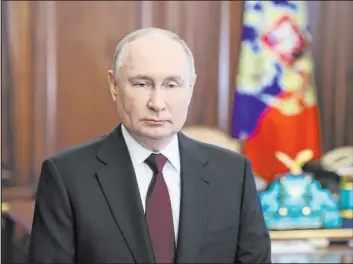  ?? Mikhail Metzel The Associated Press ?? Russian President Vladimir Putin speaking from Moscow on Thursday urges Russian citizens to participat­e in the presidenti­al election scheduled for Friday through Sunday.