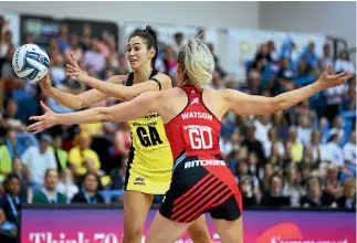  ??  ?? There is still some live sport – Pulse goal attack Ameliarann­e Ekenasio tries to elude Jane Watson from the Tactix.