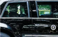  ??  ?? U.S. President Donald Trump waves as his motorcade leaves Shangri-La hotel in Singapore on Tuesday, ahead of the summit with North Korea leader Kim Jong Un.