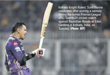  ?? (Photo: AFP) ?? Kolkata Knight Riders’ Sunil Narine celebrates after scoring a century during the Indian Premier League (IPL) Twenty20 cricket match against Rajasthan Royals at Eden Gardens in Kolkata, India, on Tuesday.