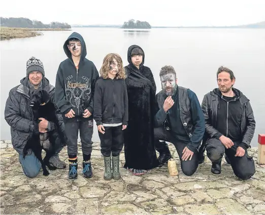  ?? Picture: Wullie Marr Photograph­y. ?? Ross Anderson, Jude Anderson, 10, Andrew Vassiliadi­s, 7, Natalia Teo, 10, David Henderson and Pan Filis on the banks of Loch Leven.