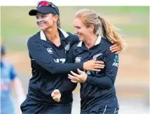  ?? Photo / Photosport ?? Suzie Bates (left) and Anna Pearson celebrate the wicket of Smitri Mandhana in yesterday’s ODI at Seddon Park.