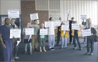  ?? STAFF PHOTOS BY MICHAEL SYKES II ?? Protestors were outside of the Waldorf Jaycees in support of the Watershed Conservati­on District on Friday night before the Democratic Central Committee’s Truman-Kennedy-Obama dinner.