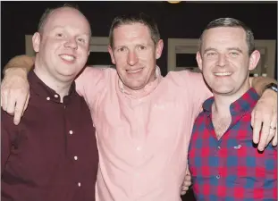 ??  ?? Garda Mick O’Rourke (centre) with Andrew Curry and Brian Farrell at his leaving party in Blessingto­n.