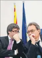  ?? ALEJANDRO GARCIA / EFE ?? Puigdemont y Mas, el lunes