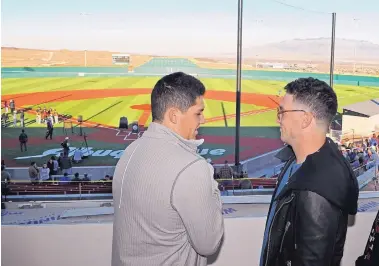  ?? JIM THOMPSON/JOURNAL ?? AJ Bregman, left, and his older brother Alex Bregman look out over the championsh­ip field at the new Albuquerqu­e Regional Sports Complex on Wednesday.