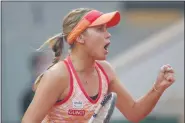  ?? MICHEL EULER — ASSOCIATED PRESS ?? Sofia Kenin of the U.S. clenches her fist after scoring a point against Petra Kvitova of the Czech Republic during their French Open semifinal match Thursday at Roland Garros in Paris.