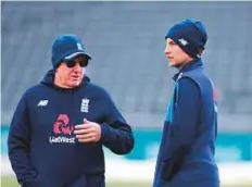  ?? Rex Features ?? Trevor Bayliss (left) England head coach with Joe Root. England’s record in Brisbane is not brilliant but still passable.