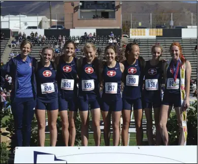  ??  ?? The Springvill­e High School girls cross country team placed sixth at state competitio­n Oct. 19. The team was led by Julie Sumsion, right, who took first place and became state champion.