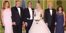  ??  ?? (From left) US First Lady Melania Trump, US President Donald Trump pose with the newly-wed Treasury secretary Seven Mnuchin and Scottish actor Louise Linton, and vice-president Mike Pence with his wife Karen.