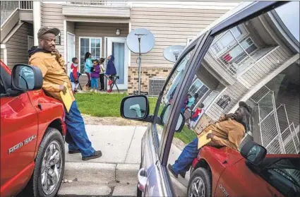  ?? Photograph­s by Robert Gauthier Los Angeles Times ?? JOHN MASSALEY, above in May, is back at work at the Smithfield plant in Sioux Falls, S.D., that was hit by the coronaviru­s.