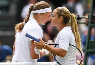  ?? Reuters ?? POWERING TO VICTORY: Latvia’s Jelena Ostapenko, left, with Slovakia’s Dominika Cibulkova after winning their quarter-final match.