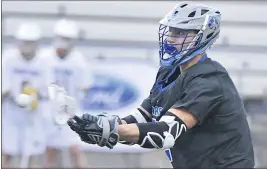  ?? WILL LESTER — STAFF PHOTOGRAPH­ER ?? Norco’s Cody Warchuck shoots against Temecula Valley during the CIF Southern Section Division 3 boys lacrosse championsh­ip match on Monday.
Division 3AA
Aquinas (19-1) at King (11-6), 7 p.m. IE Varsity info: Aquinas is making its second consecutiv­e appearance in a section final and looks to capture the program’s first championsh­ip since 1973. The Falcons are the Ambassador League champions and have won 13 straight games. Senior point guard Sheldon Grant is averaging 21.2 points and 5.9 assists per game, and senior forward Nicolas Hopkins is averaging 19.9 points and 8rebounds a game. King started the season strong, but the Wolves needed an at-large berth into the playoffs after finishing tied for third place in the Big VIII League. King has made the most of the opportunit­y, reaching the final for the first time since 2014. The Wolves are seeking the program’s fourth championsh­ip. Senior Jaden Winfield is averaging 22.8 points in the postseason. Senior Sean Rowland and junior Kenneth Clayton also average double-figure points per game in the playoffs. Division 4A
Linfield Christian (22-2) at Pilibos (18-3), 7 p.m. IE Varsity info: Linfield Christian has reached the section final for the first time since 2007 and will look to win the program’s