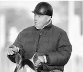  ?? CHARLIE RIEDEL/ASSOCIATED PRESS ?? Trainer D. Wayne Lukas has earned more than $278 million and won 4,804 races, including 14 Triple Crown starts.