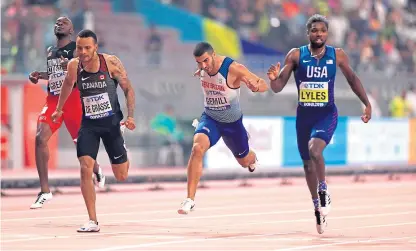  ?? Picture: PA. ?? Great Britain’s Adam Gemili crosses the line to place fourth in the men’s 200m final.