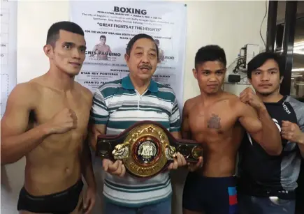  ?? Photo by Roderick Osis ?? GREAT FIGHTS. Boxing promoter Raffy Panagan holds the vacant WBA Asia super flyweight belt that will be contested by Chris Paulino and Jomar Fajardo today at the People’s Park.