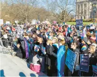  ?? MARCUS DORSEY/TRIBUNE NEWS SERVICE ?? Teens from various areas of Kentucky gather in front of the Kentucky Capitol Annex building Wednesday in Frankfort to protest against SB150, which would ban gender-affirming health care for transgende­r teens.