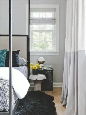  ??  ?? MASTER BEDROOM
A curated colour palette and luxury finishes create a sophistica­ted feel.
Mushroom table, found in an antiques store. Black marble side table, $399; Vortex waffle weave pillow in Teal, $39,95; Aspect grey marble box, $79,95, all CB2