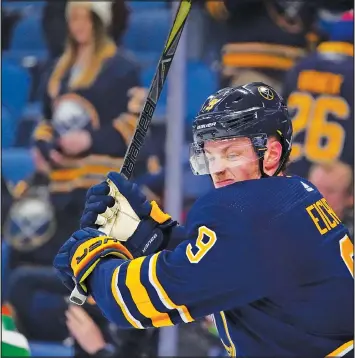  ?? IMAGES — GETTY ?? Sabres star Jack Eichel breaks his stick on the net after losing a game at the KeyBank Center in Buffalo. Eichel has yet to play in an NHL playoff game in five years.