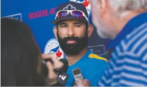  ?? CP PHOTO ?? Toronto Blue Jays right fielder Jose Bautista speaks with reporters during baseball spring training in Dunedin, Fla., on Friday.