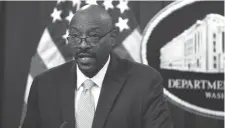  ?? ROBERTO SCHMIDT/AFP/GETTY IMAGES/TNS ?? Acting Director of the U.S. Immigratio­n and Customs Enforcemen­t, Tae Johnson, speaks during a news conference at the Department of Justice in Washington, D.C., on Oct. 26, 2021.