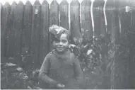  ??  ?? Ron Lutton, and (right) as a child wearing his big brother Howard’s army cap that Howard carried with him on his travels but left with the family in Portadown on his last leave visit, before deploying on Operation Gain