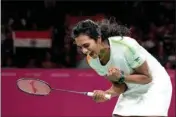  ?? PTI ?? Venkata Sindhu Pusarla of India celebrates winning match point against Jia Min Yeo of Singapore during their semifinal badminton match at the Commonweal­th Games in Birmingham, England, Sunday