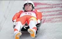  ?? MARK RALSTON/AFP/GETTY IMAGES ?? Poland’s Mateusz Sochowicz competes in the men’s luge singles on Saturday, wearing a proper visor.