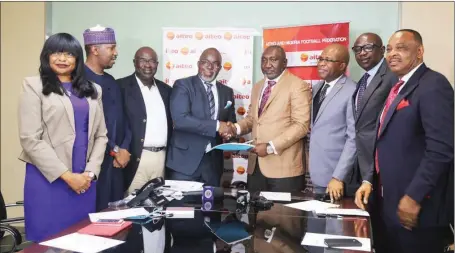  ??  ?? Nigeria Football Federation (NFF) President, Amaju Pinnick (4th left), congratula­ting the Deputy Managing Director of the AITEO Group, Francis Peters (4th right), shortly after signing the MoU on the new AITEO Cup (formerly Federation Cup) in Lagos...