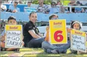  ?? AP PHOTO ?? Fans exhorting Shikhar Dhawan and Rohit Sharma at Cape Town were left disappoint­ed as both failed with the bat.