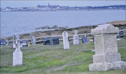  ?? CAPE BRETON POST FILE PHOTO ?? Even when there’s still light left in the day, looking at Fortress of Louisbourg National Historic Site from a nearby graveyard can be a slightly spooky experience.