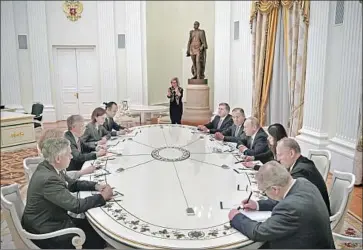  ?? Alexey Nikolsky Pool Photo ?? RUSSIAN PRESIDENT Vladimir Putin, center right, and U.S. national security advisor John Bolton, center left, take part in talks at the Kremlin in Moscow. Bolton is a longtime critic of arms control agreements.