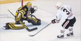  ?? JULIE JOCSAK
THE ST. CATHARINES STANDARD ?? Goalie Nick Donofrio of the Hamilton Bulldogs defends the net against Ben Jones of the Niagara IceDogs who had a hat trick in Thursday night Ontario Hockey League action at Meridian Centre in St. Catharines.