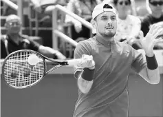  ?? — USA TODAY Sports ?? Nick Kyrgios hits a forehand against Viktor Troicki of Serbia (not pictured) during the Rogers Cup tennis tournament at Uniprix Stadium.