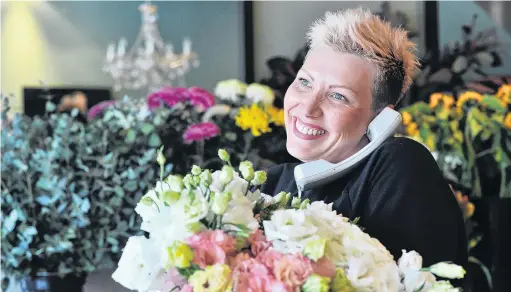  ?? PHOTOS: CHRISTINE O’CONNOR/MARK PRICE ?? Mum was the word . . . Carley Jones, manager of Joseph Jones florist in Dunedin, was flat out yesterday taking phone orders for Mother’s Day tomorrow. Below: Wanaka florist Anna Begg had to stop taking orders for Mother's Day flowers because she did not have enough time to fill them.