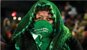  ?? Picture: Gustavo Basso ?? „ A woman shows her support in Buenos Aires, Argentina, for legal abortion. The Argentine Senate voted against a bill to legalise the procedure in the country.