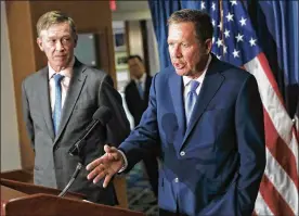  ?? CAROLYN KASTER / ASSOCIATED PRESS ?? Gov. John Kasich (right) and Colorado Gov. John Hickenloop­er are urging Congress to retain the federal health care law’s individual mandate while seeking to stabilize individual insurance markets.