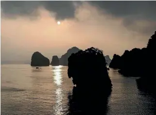  ??  ?? Ha Long Bay at sunset is a sight to behold.