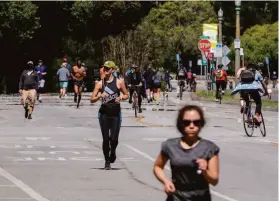 ?? Jessica Christian / The Chronicle 2020 ?? People enjoy a car-free John F. Kennedy Drive in Golden Gate Park in June 2020. The closure at the onset of the pandemic was supposed to be temporary.