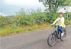  ?? ?? On your bike Cllr Liz Barrett regularly travels around her constituen­cy by bicycle