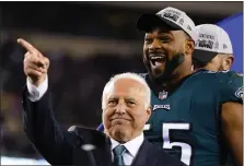  ?? MATT ROURKE - THE ASSOCIATED PRESS ?? Was Eagles owner Jeffrey Lurie, left, really pointing toward an extended future for pending free agent Brandon Graham, soon to be a 35-yearold NFL kid?