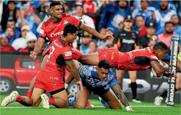  ?? PHOTO: PHOTOSPORT ?? Michael Jennings’ double against Samoa made him Tonga’s highest tryscorer in World Cup history.