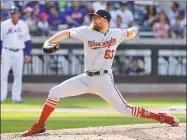  ?? Frank Franklin II / Associated Press ?? The Nationals’ Sean Doolittle delivers a pitch during the ninth inning against the Mets on Sunday in New York.