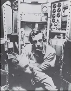  ?? ASSOCIATED PRESS ?? Lt. Don Walsh and explorer Jacques Piccard descend to the deepest spot in the world’s ocean, in 1960, a feat not repeated again by another human being until 2012, when movie director James Cameron returned to the same spot in a small submarine.