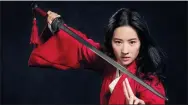  ?? STEPHEN TILLEY / DISNEY ?? Actress Liu Yifei strikes a martial pose for the upcoming movie Mulan.