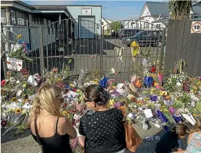  ?? WARWICK SMITH/STUFF ?? Mourners have been showing their support for Manawatu¯ ’s Muslim community since Friday’s shootings, including by leaving flowers at the mosque on Cook St, Palmerston North.