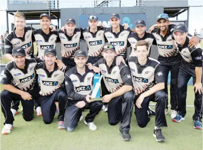  ??  ?? MOUNT MAUNGANUI: New Zealand players celebrate winning the series after the 20/20 Internatio­nal cricket match between New Zealand and Bangladesh at Bay Oval in Mount Maunganui yesterday. — AFP